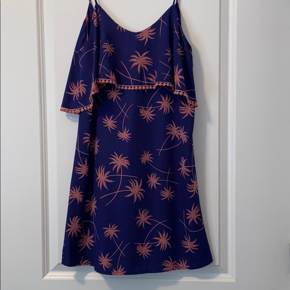 Navy romper with pink palm trees